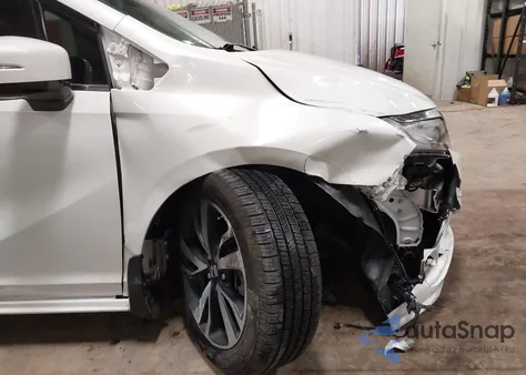 2020 Honda Odyssey Elite z USA, uszkodzony, nr VIN 5FNRL6H97LB016237